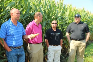 "Pursuit of 300" farmers Matt and Luke Lantz of Lake Crystal speak to reporters about their use of micronutrients to mimic the yield bump they achieve on other fields through addition of manure. With them are Gary Spence of Lake Crystal Coop and Mosaic Co. Director of Product Development Kyle Freeman. Freeman served as the consulting agronomist for the Lantz' test field.
