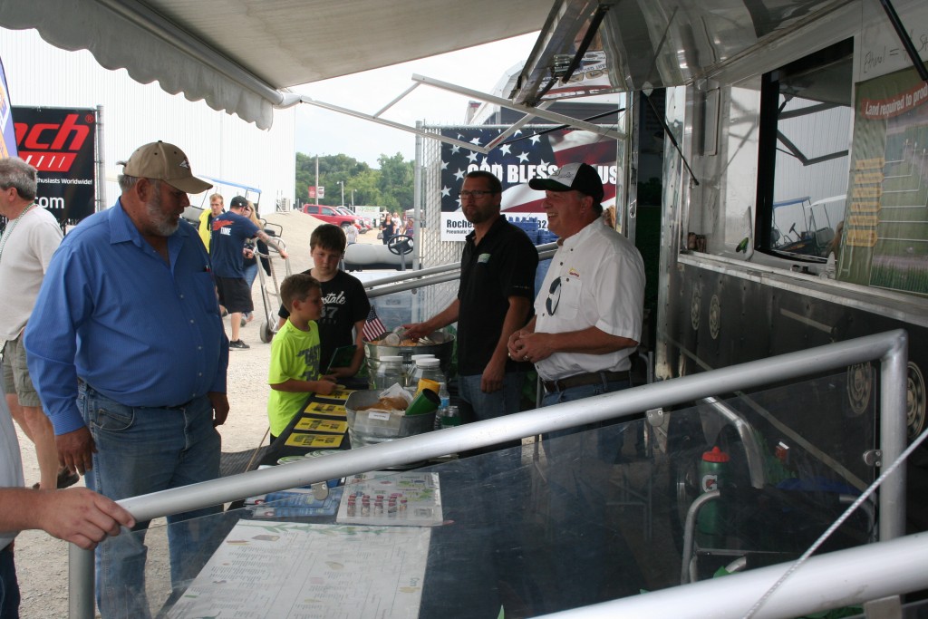 Talking ethanol at the Biofuels Mobile Education Center at Deer Creek Speedway.