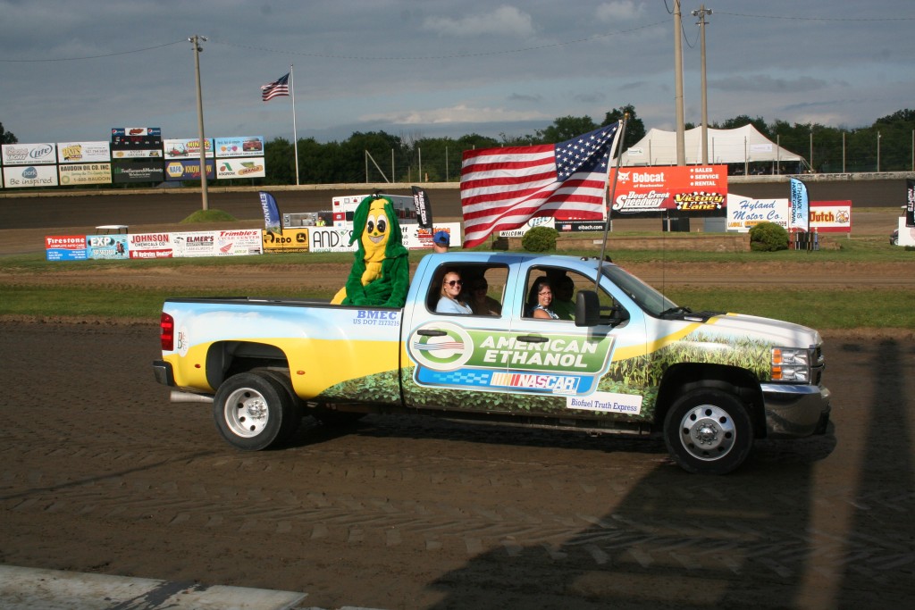 Minnesota Corn Research & Promotion Council member Scott Winslo (who also farms in Fountain, Minn.) drove the American Ethanol truck around the Deer Creek track during the national anthem. Yes, that's Ted Tassel in the back!