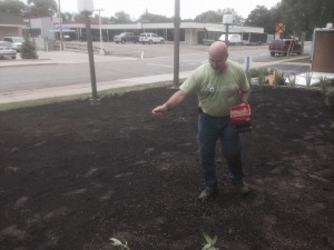 Research Director Paul Meints is coordinating the pollinator plot project. Here's Paul spreading grass seed in the center of the plot.