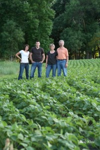 The Larson family on their farm near Evansville, Minn.