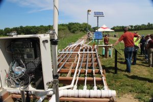 The experimental bioreactor at Gorans Farm splits the flow of tile drainage water into eight different channels in order to do four different replicated treatments, to see which reduces nitrates most effectively.