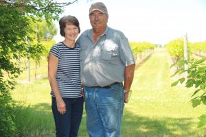Sue and Jon Roisen at their Dawson Farm where they produce corn, soybeans and wine grapes.