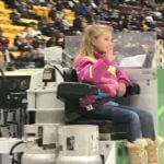 Bridget Demmer waves to the crowd