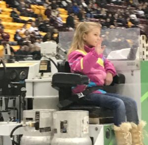 Bridget Demmer waves to the crowd