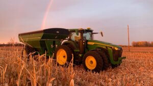 Rainbow over field corn harvest