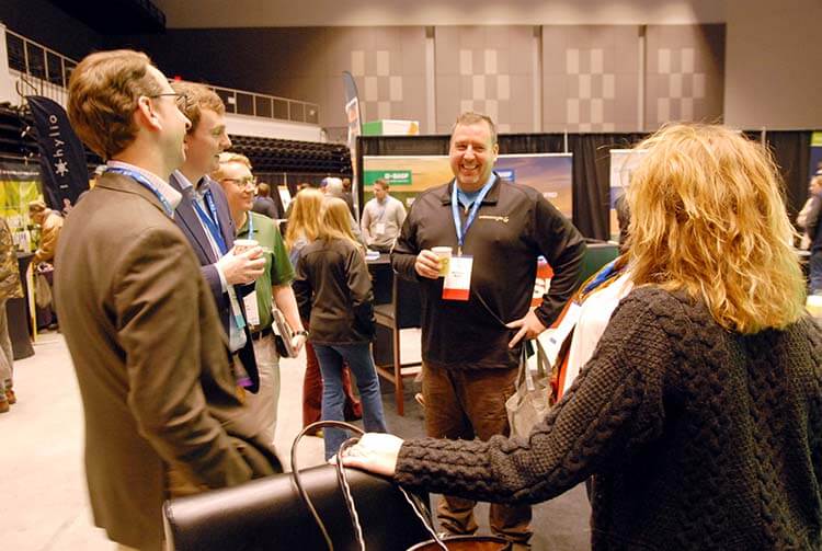 Matt Dana Adam trade show floor